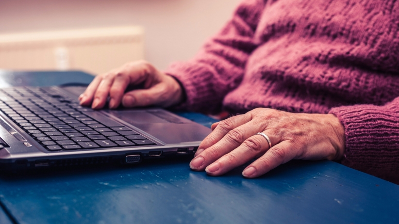 01old woman working laptop computer